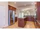 Spacious kitchen with stainless steel appliances and granite countertops at 7845 Hasentree Lake Dr, Wake Forest, NC 27587