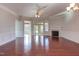 Spacious living room with hardwood floors and fireplace at 7845 Hasentree Lake Dr, Wake Forest, NC 27587