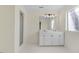 Clean bathroom with double vanity and a walk-in shower at 8179 Highway 39, Middlesex, NC 27557