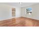 Spacious bedroom with hardwood floors and a walk-in closet at 8179 Highway 39, Middlesex, NC 27557