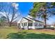 Newly renovated farmhouse with front porch at 8179 Highway 39, Middlesex, NC 27557
