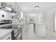 Updated kitchen with stainless steel appliances and island at 8179 Highway 39, Middlesex, NC 27557