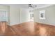 Living room with hardwood floors and shiplap accent wall at 8179 Highway 39, Middlesex, NC 27557
