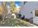 Side yard with gate access, lawn, and storage shed at 101 Pebble Springs Rd, Chapel Hill, NC 27514