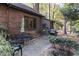 Outdoor patio with a dining set, grill, and garden area, perfect for entertaining in a private backyard at 11509 Hardwick Ct, Raleigh, NC 27614