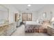 Cozy bedroom with a four-poster bed and lots of natural light at 11509 Hardwick Ct, Raleigh, NC 27614