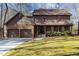 Charming two-story home featuring a well-manicured lawn, brick accents, and a two-car garage with an extended driveway at 11509 Hardwick Ct, Raleigh, NC 27614