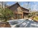 Beautifully maintained two-story home with brick and siding, complemented by a two-car garage and extended driveway at 11509 Hardwick Ct, Raleigh, NC 27614