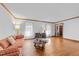 Spacious living room with hardwood floors and neutral walls, perfect for relaxing and entertaining at 11509 Hardwick Ct, Raleigh, NC 27614