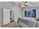 Bright bedroom with a view to a private balcony and the laundry room at 1304 Rothes Rd, Cary, NC 27511