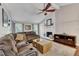 Spacious living room with a vaulted ceiling, a fireplace, and hardwood floors at 1304 Rothes Rd, Cary, NC 27511