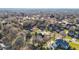Aerial view of a residential neighborhood with large homes and lush landscaping at 2035 Stuart Ct, Burlington, NC 27215
