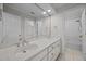 Large bathroom with a dual sink vanity, an over-sized mirror and an ensuite bathroom at 2035 Stuart Ct, Burlington, NC 27215