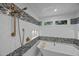 Bathroom showcasing a standalone tub and a shower stall with luxurious shower fixtures at 2035 Stuart Ct, Burlington, NC 27215