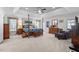 Main bedroom with a post bed, plenty of natural light, and sitting area at 2035 Stuart Ct, Burlington, NC 27215