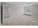 Large bedroom features an ensuite bathroom, a ceiling fan and a sunny window seat at 2035 Stuart Ct, Burlington, NC 27215