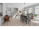 Breakfast nook with adjacent kitchen access and tile floors at 2035 Stuart Ct, Burlington, NC 27215