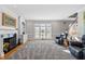 Gathering room with fireplace and built-in shelving at 2035 Stuart Ct, Burlington, NC 27215