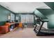 Home gym with treadmill and desk for a productive workout at 2035 Stuart Ct, Burlington, NC 27215