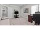 Bright home office features built-in shelving and comfortable seating at 2035 Stuart Ct, Burlington, NC 27215