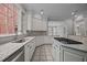 Bright kitchen featuring granite countertops, stainless steel appliances, and a view to the dining room at 2035 Stuart Ct, Burlington, NC 27215