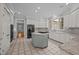 Gourmet kitchen with granite countertops, center island, and stainless steel appliances at 2035 Stuart Ct, Burlington, NC 27215