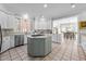Spacious kitchen featuring granite countertops, an island, and stainless steel appliances at 2035 Stuart Ct, Burlington, NC 27215