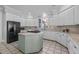Modern kitchen with stainless steel appliances and a large island at 2035 Stuart Ct, Burlington, NC 27215