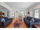 Spacious living room with hardwood floors and comfortable seating at 2035 Stuart Ct, Burlington, NC 27215