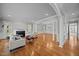 Spacious living room featuring hardwood floors, fireplace, and elegant architectural details at 2035 Stuart Ct, Burlington, NC 27215