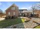 Brick patio with fire pit and seating area at 2035 Stuart Ct, Burlington, NC 27215