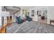 Sunlit sitting room with hardwood floors and comfortable seating at 2035 Stuart Ct, Burlington, NC 27215