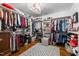 Large walk-in closet with ample shelving and hanging space at 2035 Stuart Ct, Burlington, NC 27215