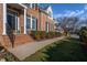 Brick home with a two-car garage and a landscaped front yard at 2328 Carriage Oaks Dr, Raleigh, NC 27614