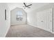 Bedroom featuring neutral walls, vaulted ceiling and double closet at 235 Harbor Creek Dr, Cary, NC 27511