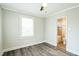 Spacious bedroom with wood-look floors and ensuite bathroom at 2400 Dorety Pl, Raleigh, NC 27604