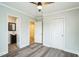 Bedroom with two closets and access to a full bathroom at 2400 Dorety Pl, Raleigh, NC 27604
