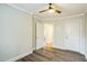 Bright bedroom with ceiling fan and ample closet space at 2400 Dorety Pl, Raleigh, NC 27604