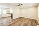 Open concept dining area with hardwood floors and kitchen access at 2400 Dorety Pl, Raleigh, NC 27604