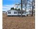 Charming single-story home with black shutters and a cozy front porch at 2400 Dorety Pl, Raleigh, NC 27604