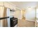 Efficient kitchen with stainless steel appliances and granite counters at 2400 Dorety Pl, Raleigh, NC 27604