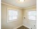 Laundry room with natural light from two windows and ample wall outlets at 2400 Dorety Pl, Raleigh, NC 27604