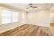 Spacious living area with hardwood floors and neutral walls at 2400 Dorety Pl, Raleigh, NC 27604