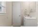 Bright bathroom with a white vanity, neutral walls, and a clean, functional design at 2400 Keith Dr, Raleigh, NC 27610