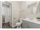 Traditional bathroom with white toilet and single vanity sink at 2400 Keith Dr, Raleigh, NC 27610