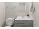 Traditional bathroom with white toilet and single vanity sink at 2400 Keith Dr, Raleigh, NC 27610