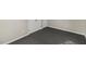 Neutral bedroom with plenty of storage featuring durable carpeting and closet space at 2400 Keith Dr, Raleigh, NC 27610