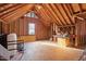 Spacious unfinished attic features exposed wood beams and plenty of potential at 2612 Hiking Trl, Raleigh, NC 27615