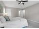 Well-lit bedroom with a queen-size bed and ample closet space at 2612 Quarry Springs Rd, Raleigh, NC 27610