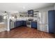 Modern kitchen with stainless steel appliances and granite countertops at 2612 Quarry Springs Rd, Raleigh, NC 27610